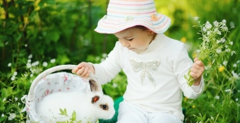 cute little girl with white rabbit
